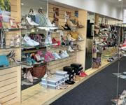 UNDER CONTRACT  WELL ESTABLISHED AND RESPECTED FOOTWEAR RETAILER, RENOWNED FOR STYLE,